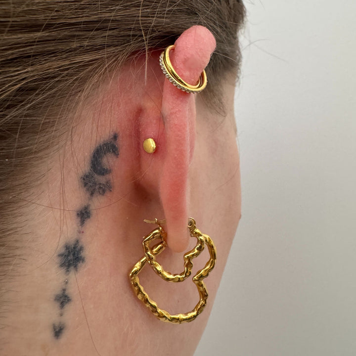 Cirkeline - Piercing forgyldt med zirkoner